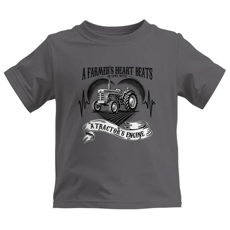 A Farmer’s Heart Beats A Tractor’s Engine - Kids Heavy Cotton™ Tee