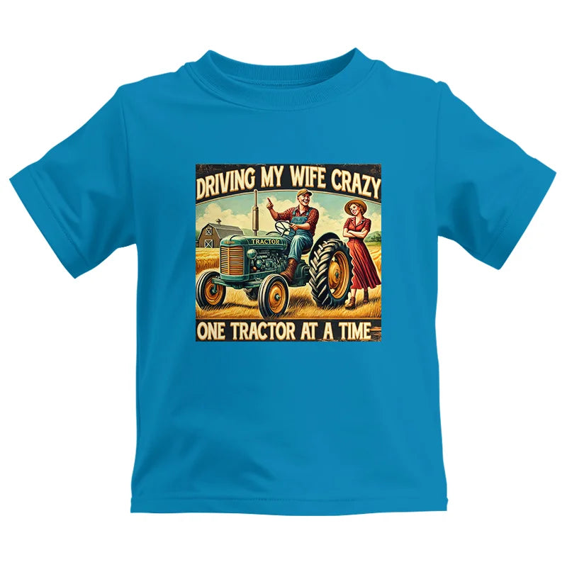 Driving My Wife Crazy One Tractor At A Time - Kids Heavy Cotton™ Tee