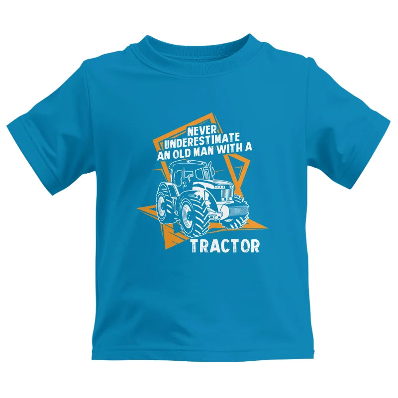 Never Underestimate An Old Man With A Tractor Farming Dad - Kids Heavy Cotton™ Tee