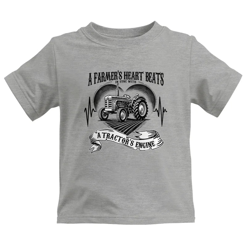 A Farmer’s Heart Beats A Tractor’s Engine - Kids Heavy Cotton™ Tee