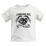 A Farmer’s Heart Beats A Tractor’s Engine - Kids Heavy Cotton™ Tee