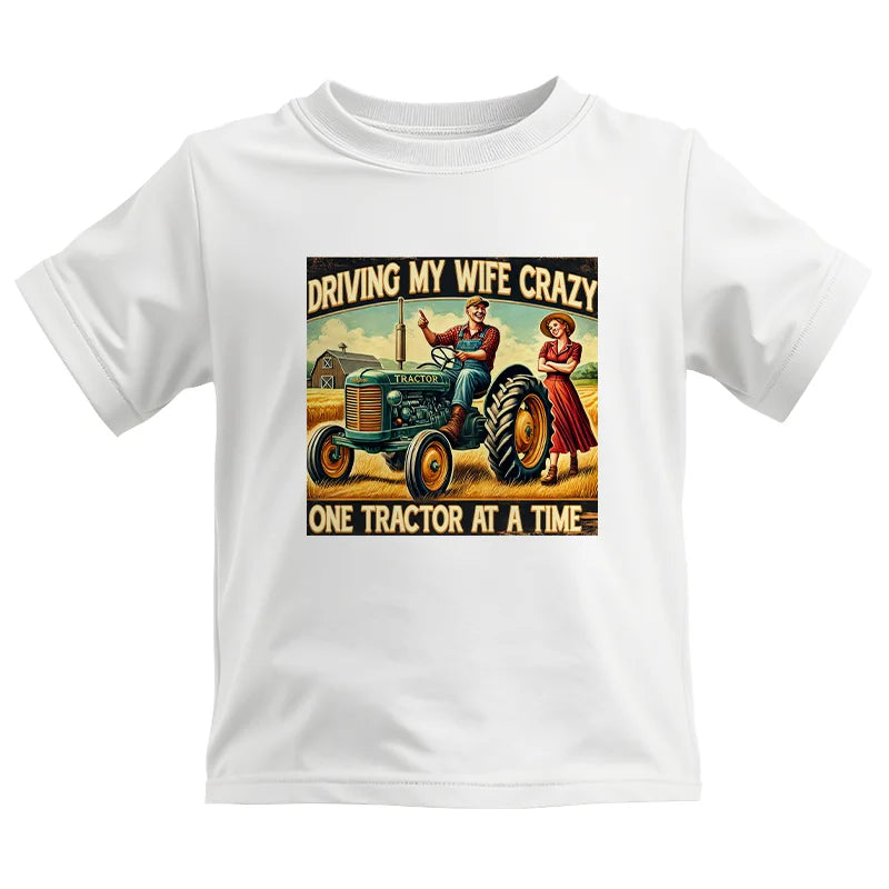 Driving My Wife Crazy One Tractor At A Time - Kids Heavy Cotton™ Tee