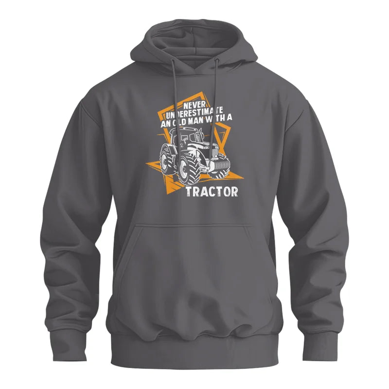 Image of Never Underestimate An Old Man With A Tractor Farming Dad - Unisex Heavy Blend™ Hooded Sweatshirt