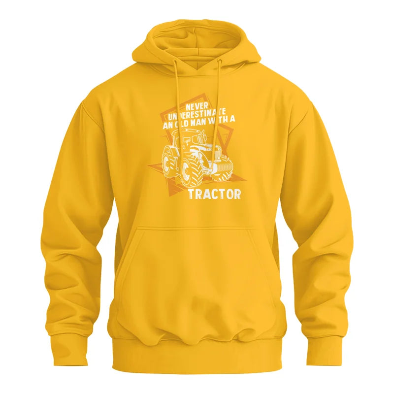 Image of Never Underestimate An Old Man With A Tractor Farming Dad - Unisex Heavy Blend™ Hooded Sweatshirt