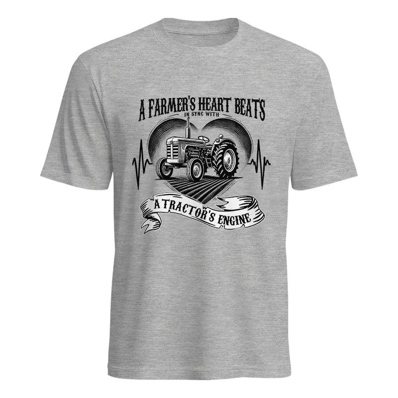 A Farmer’s Heart Beats A Tractor’s Engine - Unisex Heavy Cotton Tee