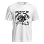 A Farmer’s Heart Beats A Tractor’s Engine - Unisex Heavy Cotton Tee