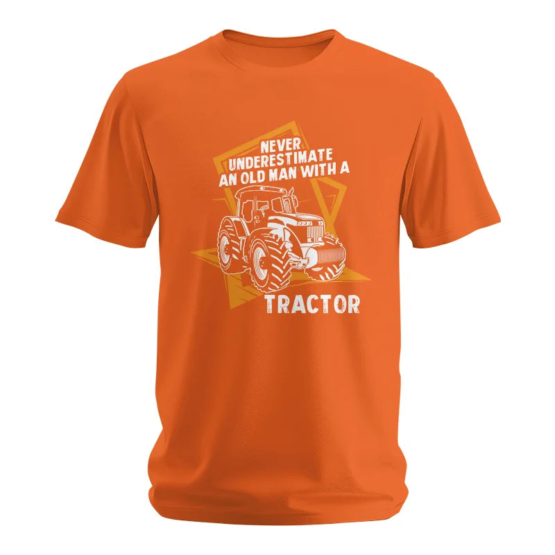 Image of Never Underestimate An Old Man With A Tractor Farming Dad - Unisex Softstyle T-Shirt